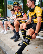 Team Jumbo Visma recovering in compression socks.