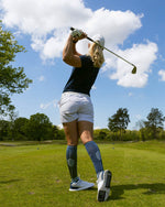 Romy Meekers at the end of her golf swing.