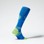The side of a blue compression sock with yellow details.
