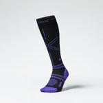 Front view of a black colored knee high compression sock with purple accents.