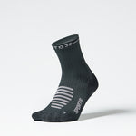 Front view of a dark grey ankle high compression sock.