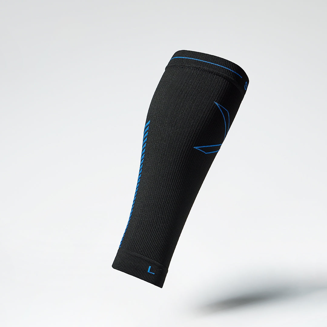 Side view of a black compression calf sleeve with blue details.
