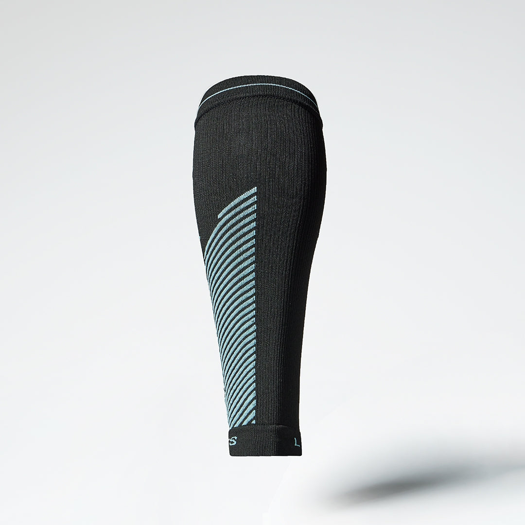 Back view of a black compression calf sleeve with blue details. 