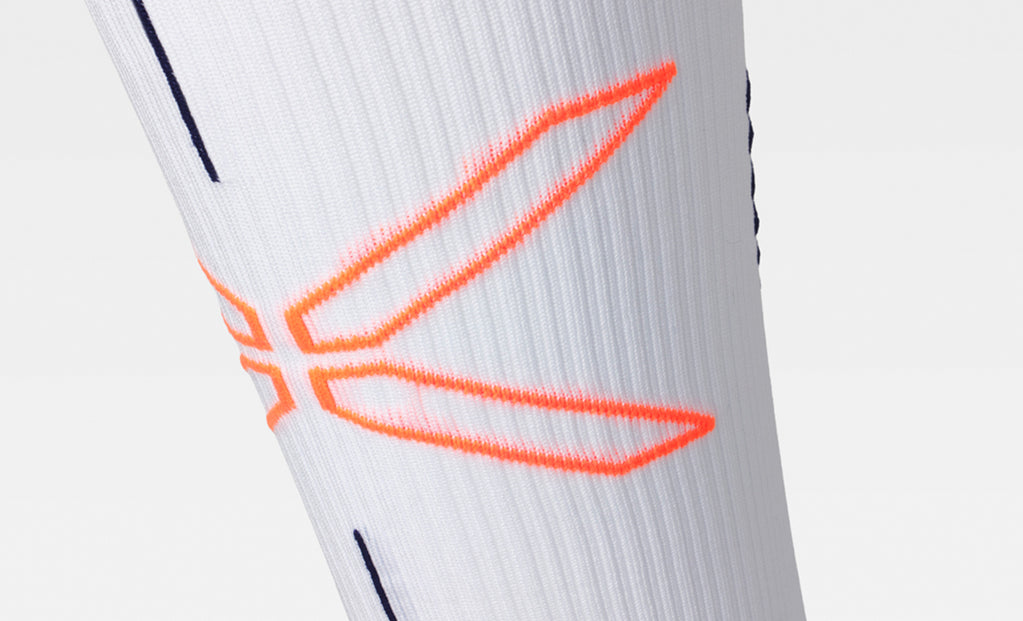 White sock with orange STOX design on a white background