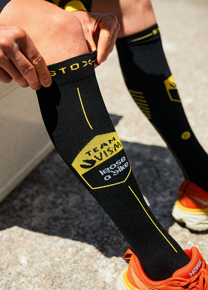 High knee socks in yellow and black.