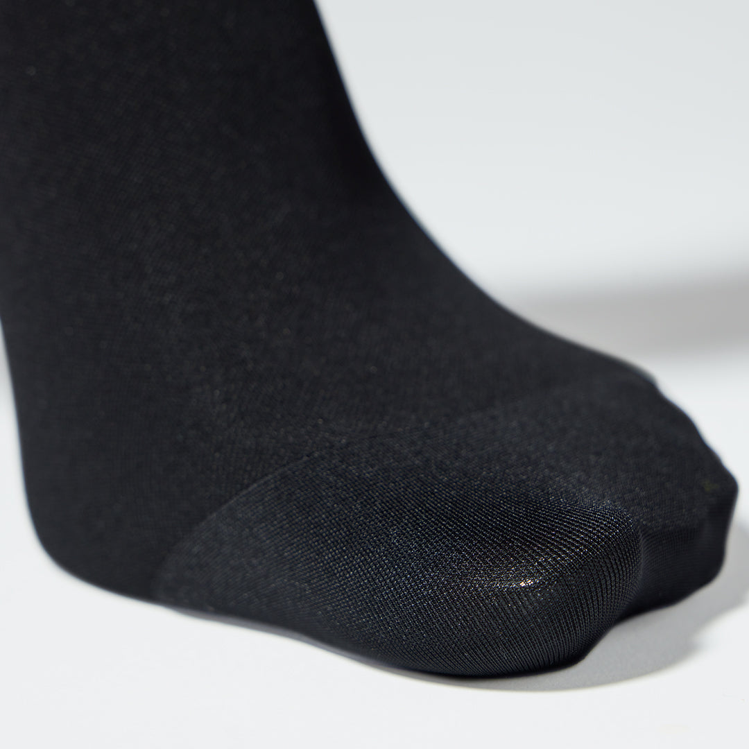 Detailed shot of the foot part of compression tights for everyday use. 