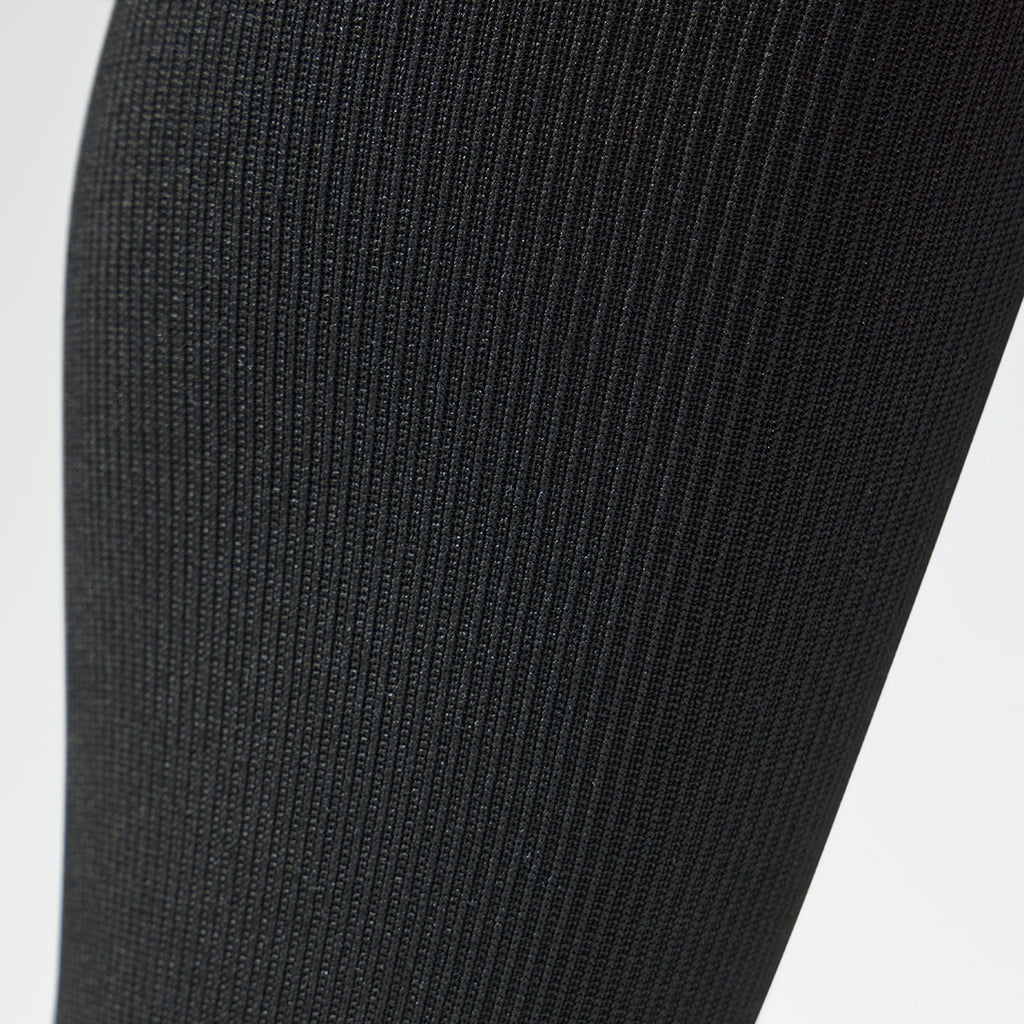 Detailed view of black unisex compression socks. 