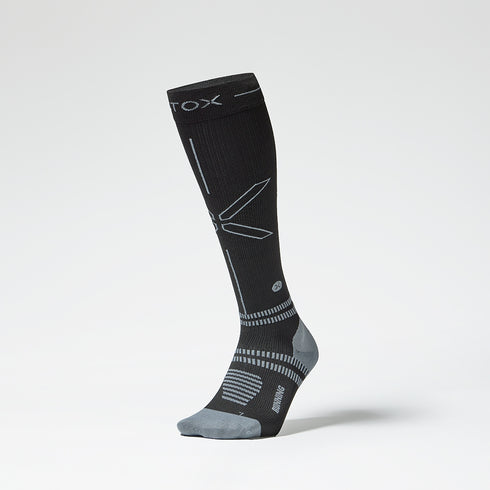 Front view of a Black standing sock with grey details.