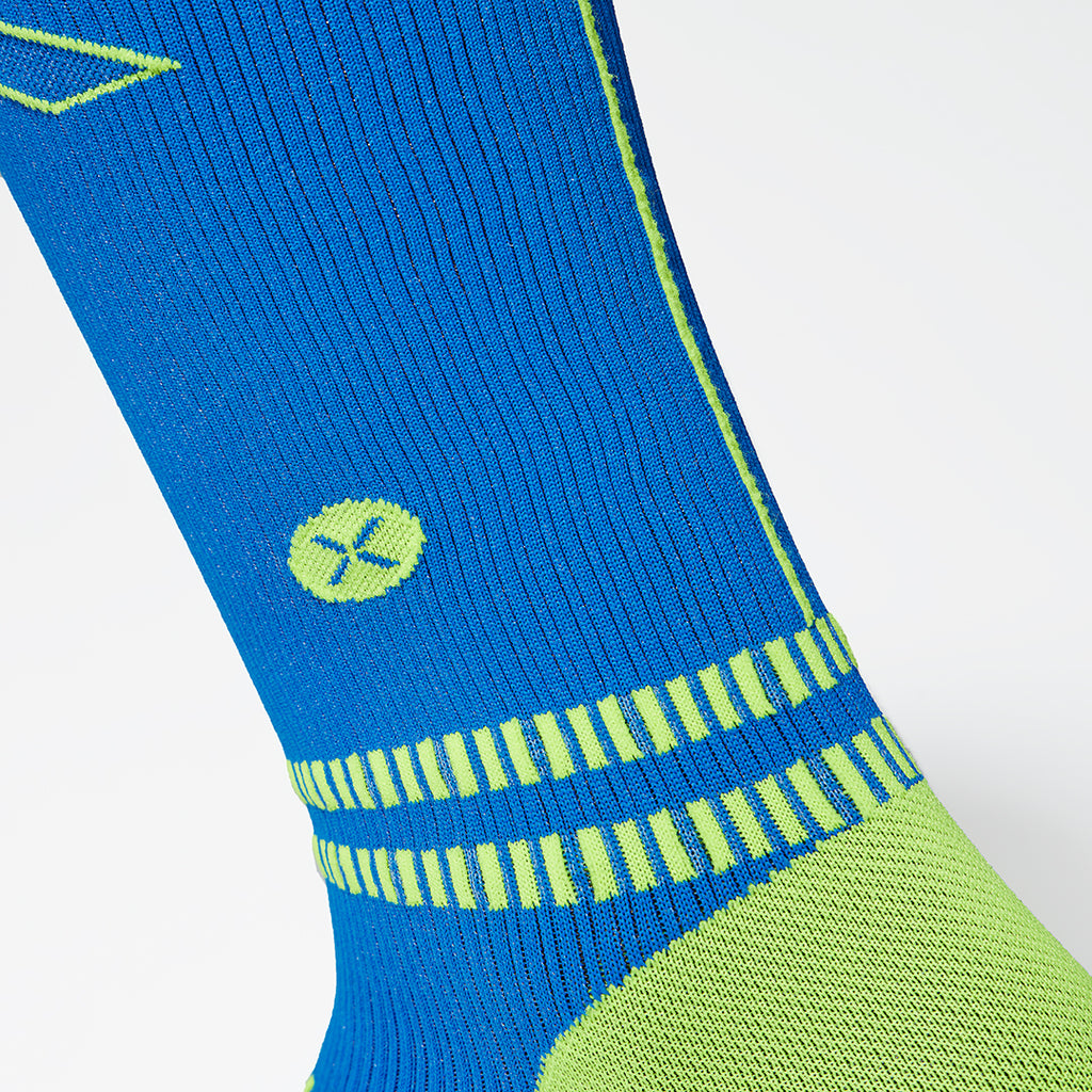 Close-up picture of blue compression sock with yellow heel