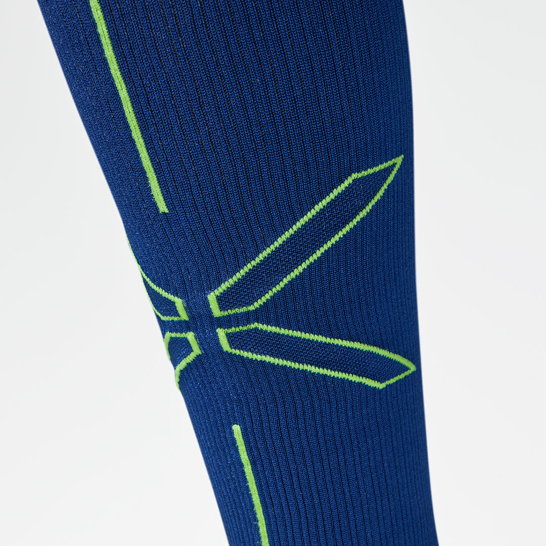 Close up picture of a dark blue sock with yellow details.