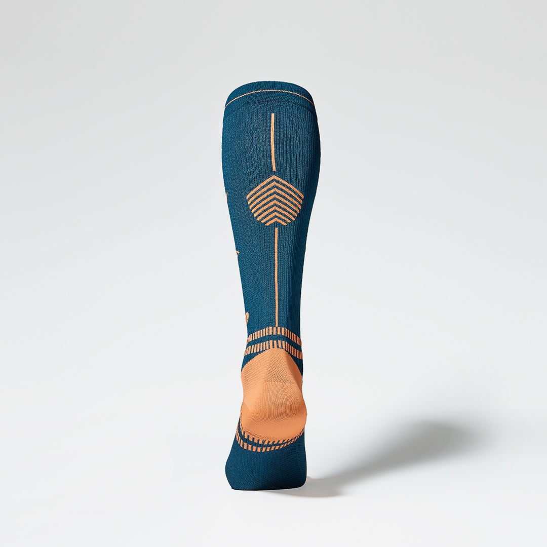 Back view of a Knee high blue regatta compression sock.