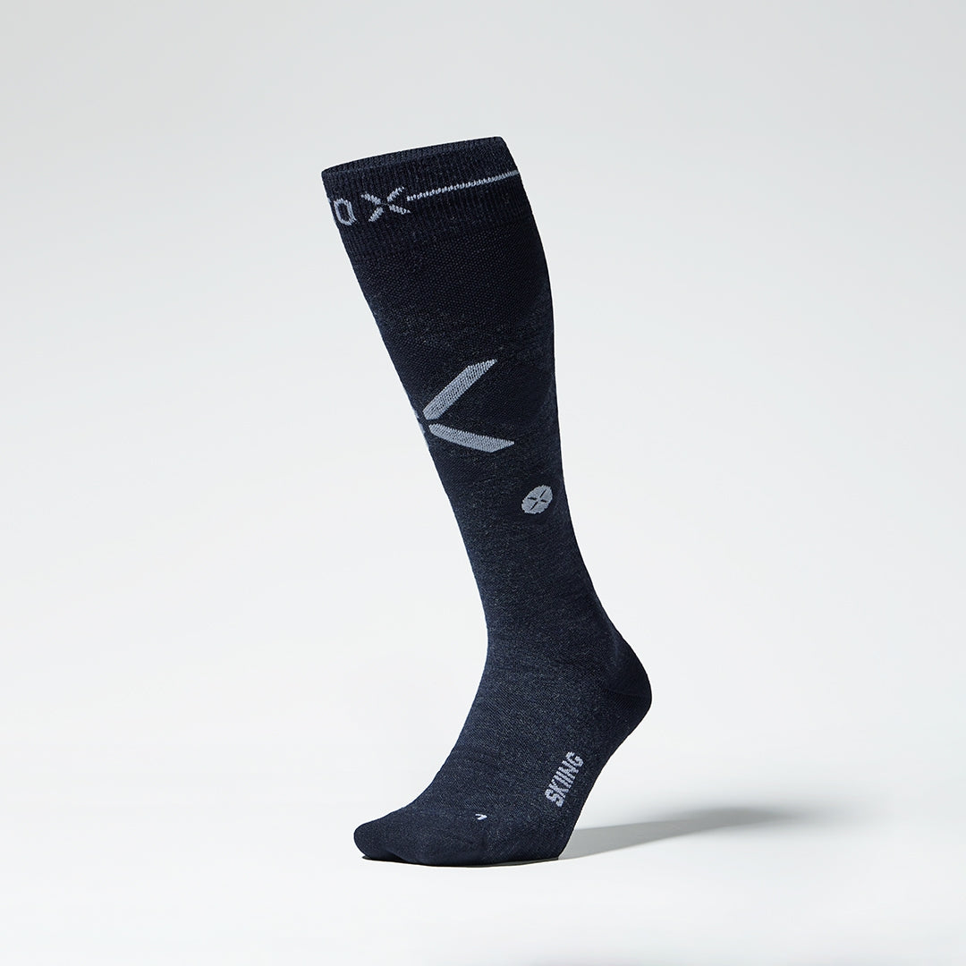 Front view of dark navy compression socks with white details.