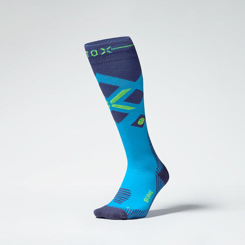 Front view of turquoise compression socks with yellow details.