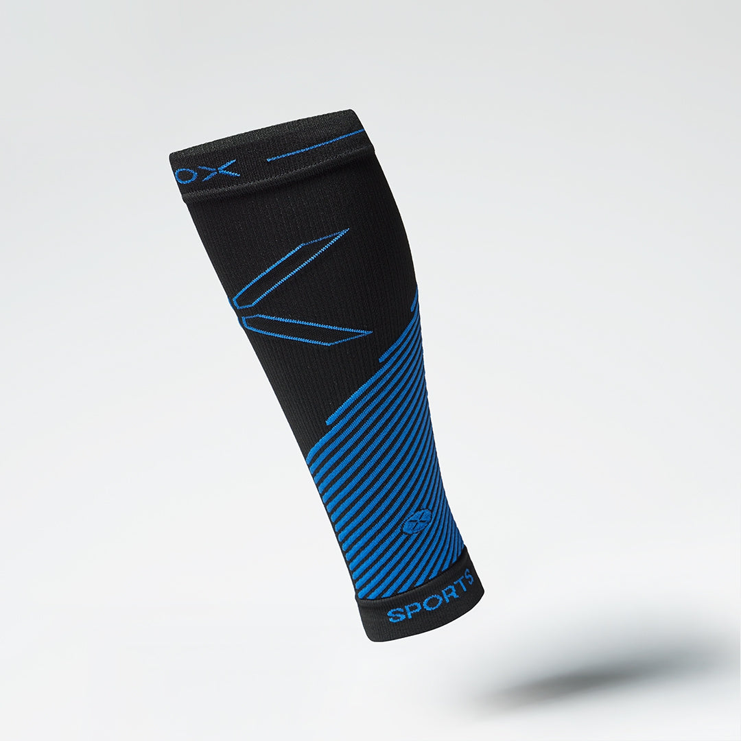 Front view of a black compression calf sleeve with blue details.