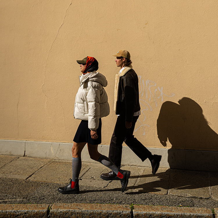 Two people walking.