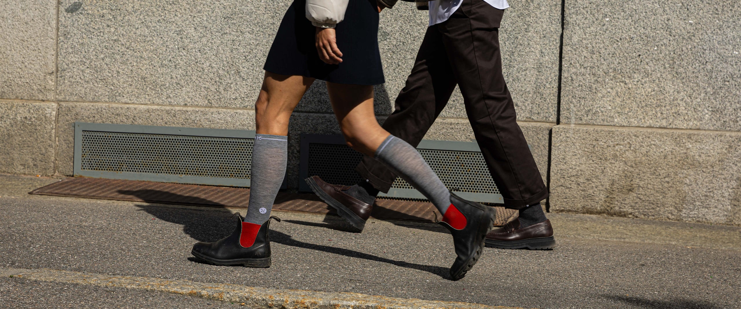 Couple walking over the streets.