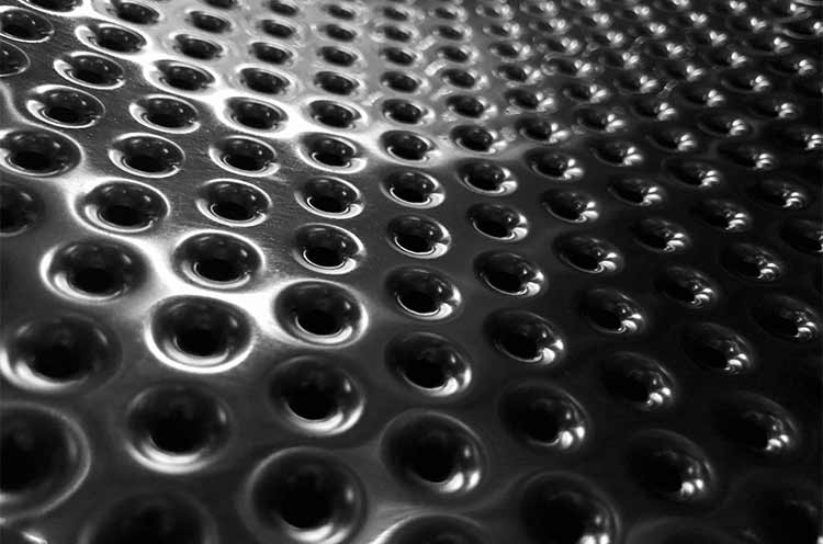 Close up detail shot of the inside of a washing machine.