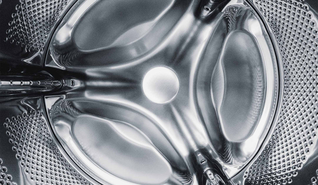 The metal inside of a washing machine. 
