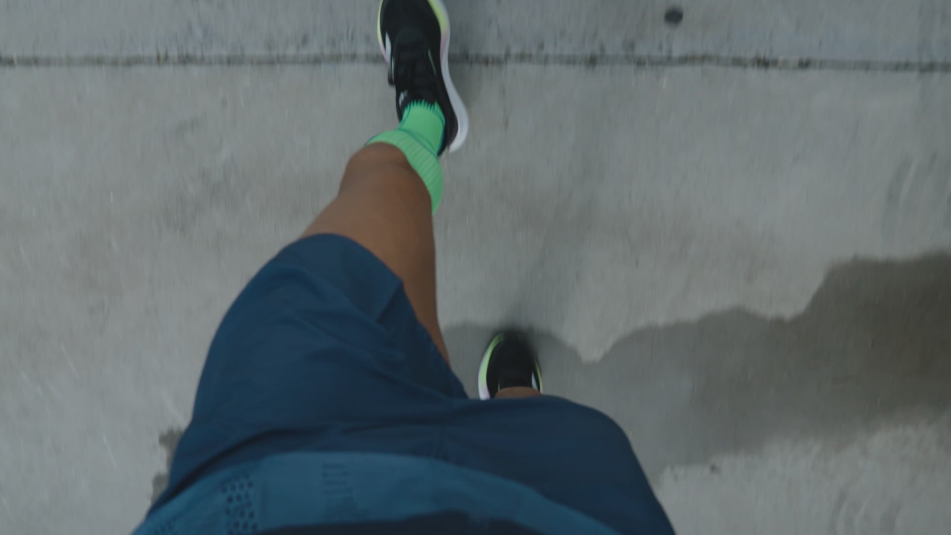Legs running in the city.